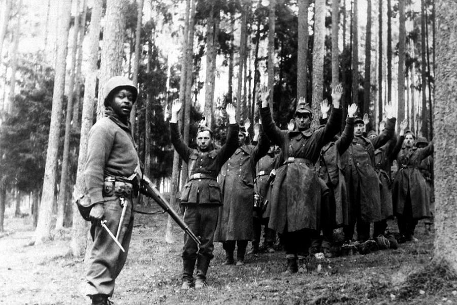 U.S. Soldier Guards German Prisoners