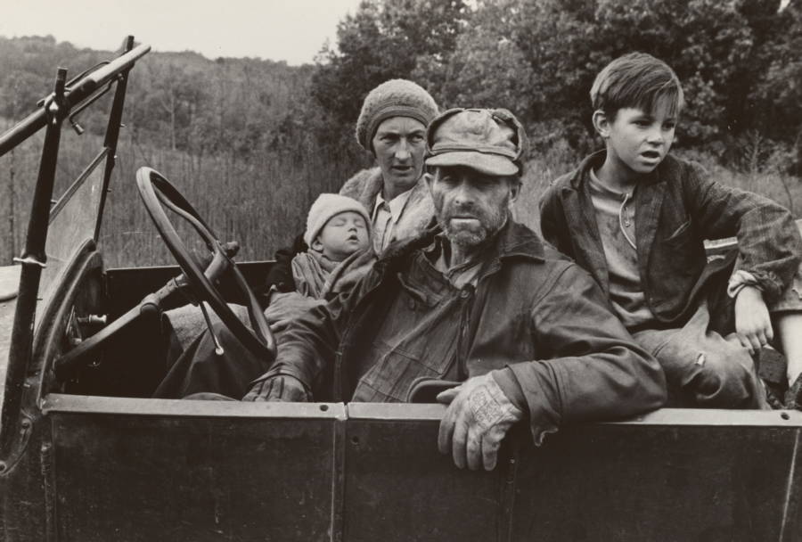 Family Sitting In Car