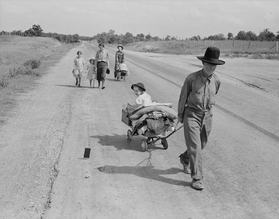 Family Walking Down Road