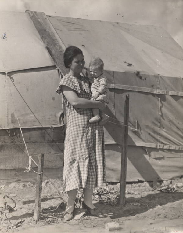 Mother Holding Child Outdoors