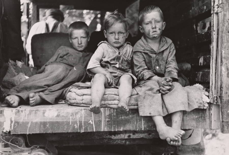 Three Kids Sitting Down