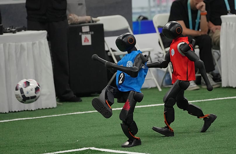Robots playing soccer
