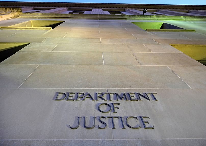 FILE - Tthe Department of Justice headquarters building in Washington is photographed early in the morning, May 14, 2013